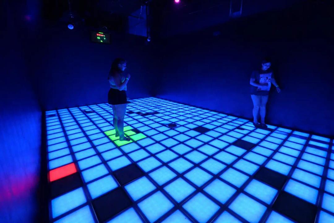 Interactive floor challenge at Pixel Pulse Play